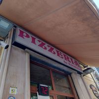 The number on the display is for sitting, on the right side of it is the line to take away! at Pizzeria da Michele in Naples
