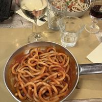 pici al pomodoro (=pasta with tomato sauce) and pici all’aglione (=pasta with garlic, fresh tomato, basil and walnuts), both vegan  at A Casa Tua in Certaldo