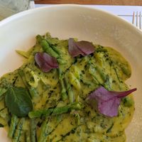 Homemade ravioli with asparagus, artichokes and fennel in an almond milk sauce at Roof Garden in Athens