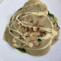 Vegan pumpkin ravioli with asparagus cauliflower purée  at Roof Garden in Athens