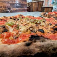 Build your own with vegan mozz, roasted garlic, jalapeno, caramelized onion at Brick Pizzeria Napoletana in North Dartmouth