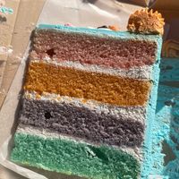 Vanilla rainbow cake 🌈   at Trick or Treat Vegan Sweets (formerly Canelita Sweets) in San Diego