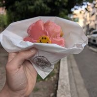 flower shaped donut eaten outside at Trick or Treat Vegan Sweets (formerly Canelita Sweets) in Osaka