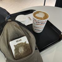 Latte hot oat milk add 1 shot  at Caffeinated in Busan