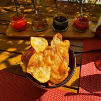 Chips with 3 vegan sauces, one of the four sauces was not vegan at Eat Me Kech in Marrakech