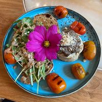 This tofu scramble was amazing.  Topped with mushrooms and served with gf sourdough.  So so good    at Benny & Bloom in Kuta
