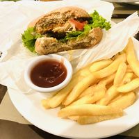 Soyo burger with fries 🍟  Delicious ✨   at Loving Hut - Costa Rica in Heredia