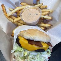 Bacon cheeseburger, fries, and a side of house special sauce!  at Juicy J's Smoked Burgers in Poulsbo