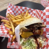 Western burger with side of fries   at Juicy J's Smoked Burgers in Poulsbo