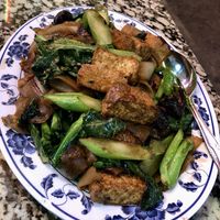 Fried noodles with tofu and broccoli  at Sanamluang Cafe in Los Angeles