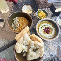 Course 2 with roti, ferment, and pickle   at Hawker in Toronto