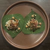 Perilla Leaf (smoked cabbage, pickled mushrooms, beet reduction, chili cream, pistachio)  at Hawker in Toronto
