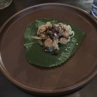 Perilla leaf with smoked cabbage, pickled mushroom, beet reduction, chili cream, pistachio at Hawker in Toronto