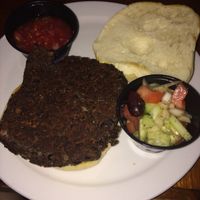 the bean burger with salsa and mediterranean medley side dish at Mr Bones BBQ in Holmes Beach