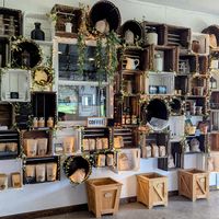 Cute wall with local items for sale (jam, tea, coffees, soaps, etc). at Doyle Farms in North Rose