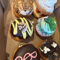 Samosa, strawberry shortcake, mermaid?, chocolate everything, Boston cream and Cookie Monster   at Rock N Roll Donut Bar in Monterey