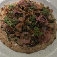 Vegan polenta with mushrooms   at HYG Restaurant & Bar in Weggis