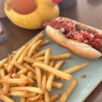 Vegan hotdog and “the ducks” cocktail  at Sapori in Mallorca