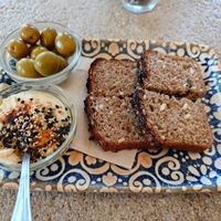 Selfmade bread, hummus and olives at El Perrito in Mallorca