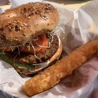 Garden sprout breakfast sandwich on an everything bagel with a hash brown   at Honeycomb Cafe in Scarborough