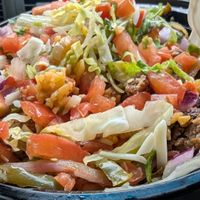 Vegan burrito bowl with chips at B-UNOS in Mt Holly