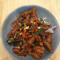 Sweet spicy glazed chikn w/curry leaves $20.50: crispy, very nice at Vegify in Knoxfield