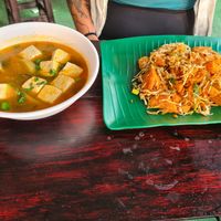 fermented cabbage and tofu in tomato soup and chickpea tofu at Pa Yod Shan Vegetarian Cafe in Chiang Mai