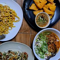 Shan noodles, Shan tofu, rice noodles soup with mushroom curry and tea leaves salad at Pa Yod Shan Vegetarian Cafe in Chiang Mai