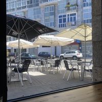 Outdoor seating   at Numero 13 in Chantada