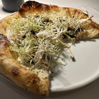 Carmelized onion and pancetta pizza … whoops forgot to take a pic before diving in!  at Crossroads Kitchen in Las Vegas