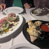 OMG GET THE WEDGE (left) because it’s the best wedge I have ever had. Their blue cheese and “bacon” is unbelievable! Other items were from their seasonal menu and also delici at Crossroads Kitchen in Las Vegas