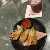 Stuffed ricotta Artichoke flowers paired with mocktail  at Crossroads Kitchen in Las Vegas