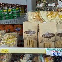 Classic Sardinian flatbreads (vegan). at Market Panedda in Olbia