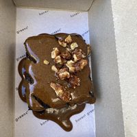 Cauliflower brownie   at Honest Greens in Porto