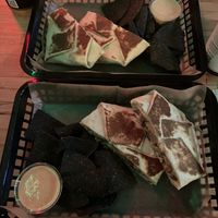 Potato crunchwraps with regular and blanco queso 🤤  at JDs VegMex in Miami