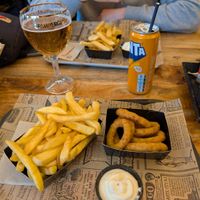 Medium fries, vegan mayo and onion rings. at FritBar in Bruges