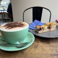 Oat cappuccino and cake   at The Chakra Lounge in Bakewell