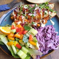 Indian style hotdog and salad 😍 at The Chakra Lounge in Bakewell