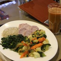 This meal has for example arrow roots, rice and mixed vegetables that had 6-7 different vegetables. Also is freshly made organic juice that had carrots, apple and spinach.  at Bridges Organic Health Restaurant in Nairobi
