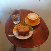 Apple cake, cappuccino with oatmilk, free water to drink at Intense Coffee in Luxembourg City