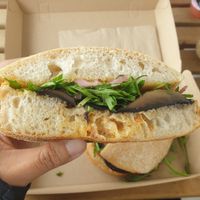 The Shroom: Grilled portobello mushroom, harissa aioli, pickled red onion, and rocket on toasted ciabatta roll at For Change in Middle Park