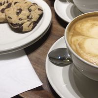 Soy milk latte and vegan cookies  at Vennels Café in Durham