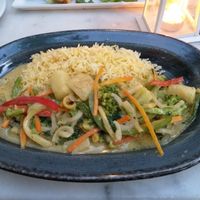 Green curry with coconut milk, vegetables, and potatoes at Mana Mana in Paros