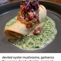 deviled oyster mushrooms, garbanzo flour crepe, hearts of palm, creamed spinach  at Vedge in Philadelphia