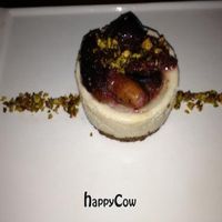 cheesecake with black mission figs, white port reduction, and pistachio at Vedge in Philadelphia