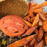Vegan Black Bean Burger: Whole Wheat Roll, Grilled Bell Peppers, Mushrooms, Onions, Jalapeno, Tomatoes, Lettuce, Avocado, Sweet Potato Fries at Purity Ice Cream in Ithaca