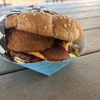 BBQ bacon cheeseburger with onion rings   at Tabay's Mindful Kitchen in Kahului