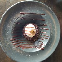 Vegan hot brownie with vanilla ice cream at Black Crust Pizzeria in Vik