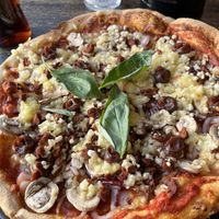Vegan pizza   at Black Crust Pizzeria in Vik