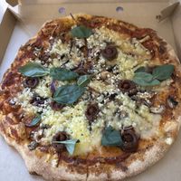 Vegan pizza without the substitute meat and sourdough crust   at Black Crust Pizzeria in Vik